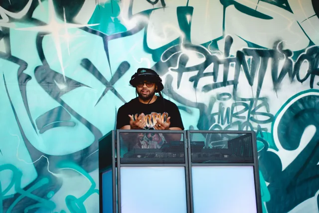 A DJ performing at the colourful Paintworx festival.