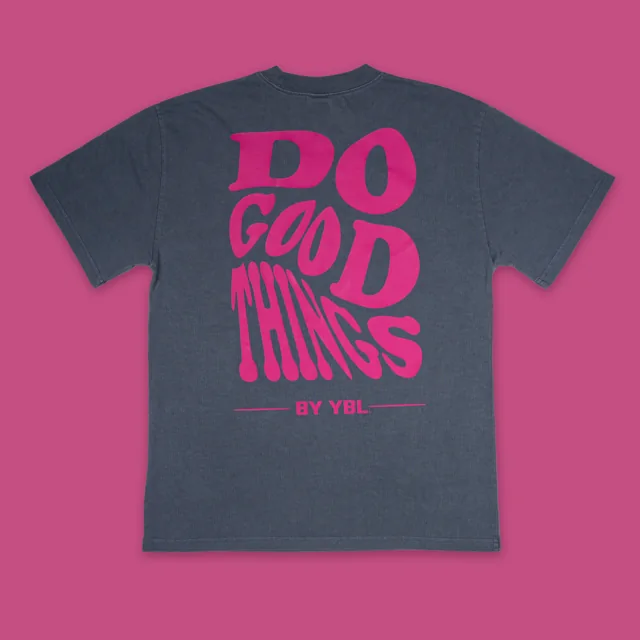 A dark T-shirt with Do Good Things lettering on a pink background.